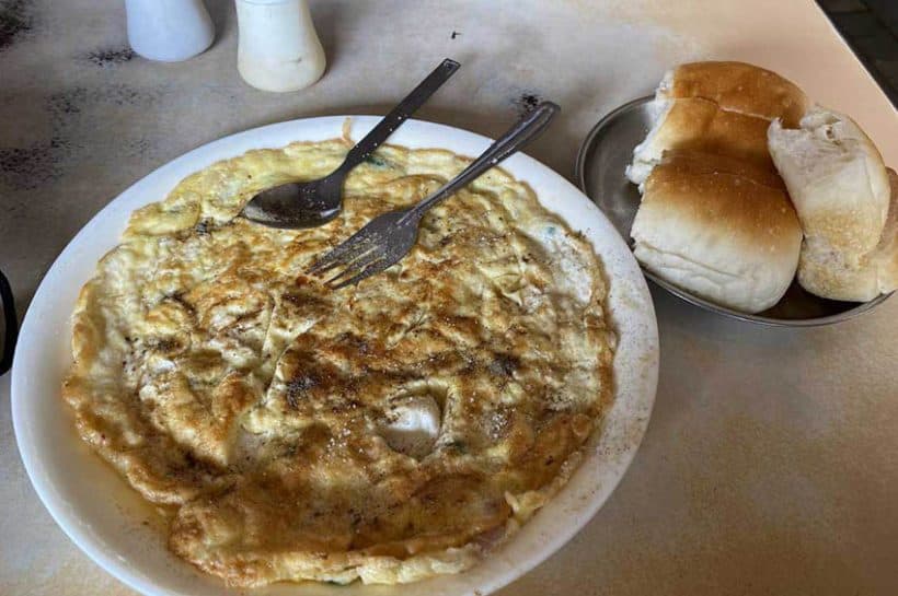 Omlette and soft bread with butter- iconic breakfast in Bombay
