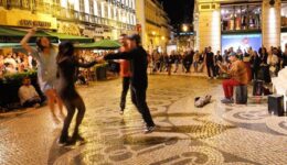 Strangers dancing at 10:30 to a street artist