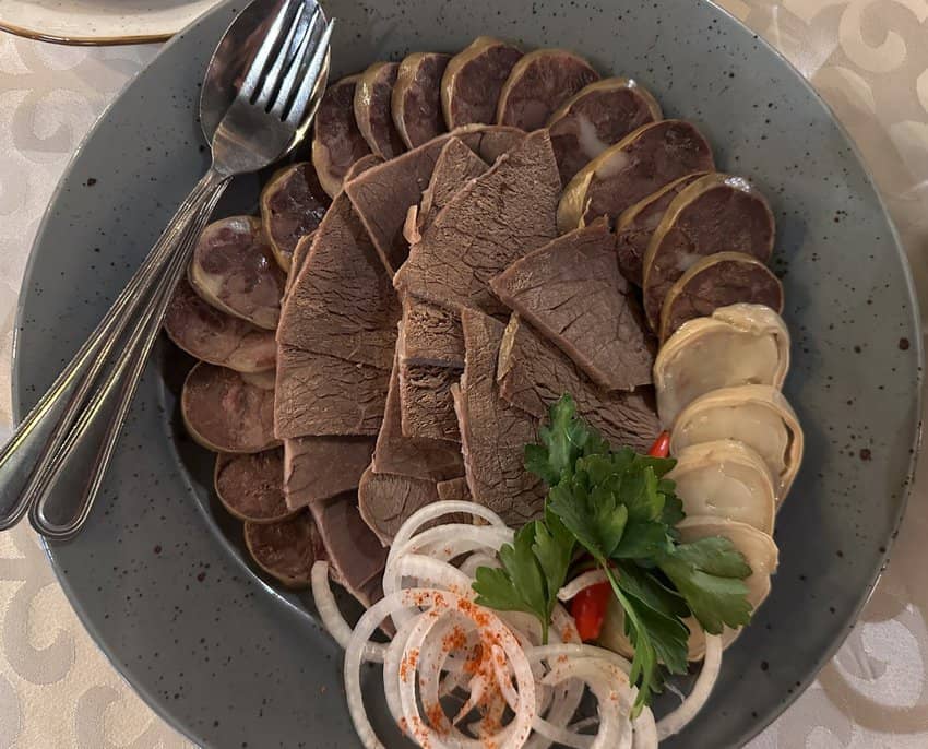 The Qaimaq Restaurant serves traditional Kazakh cuisine, including a variety of processed horse meat and sausages