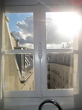 Looking out the window of the Paris apartment.