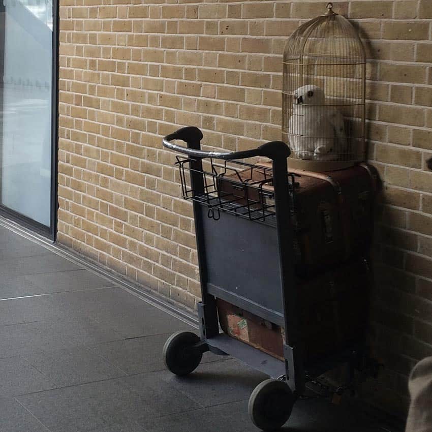 The sculpture of a luggage cart entering the Platform 9 3/4 as mentioned in the Harry Potter book series can be seen at the King’s Cross station.