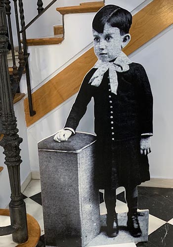 A life-size photo of Picasso welcomes visitors to his birthplace museum.