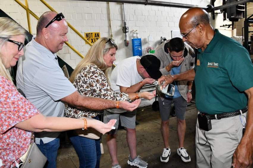 Horses, Bourbon, and More in Central Kentucky 7 Guests taste and smell unaged whiskey before it gets barrelled
