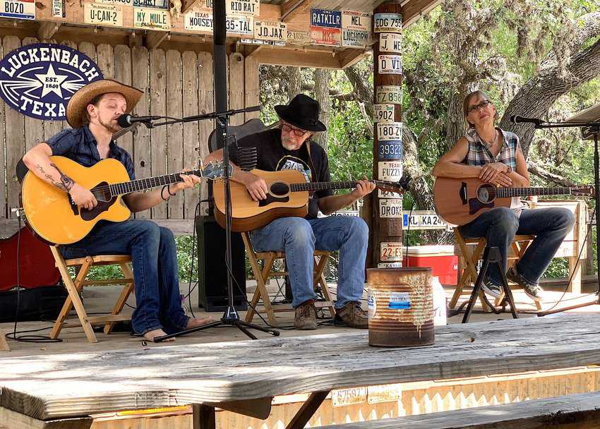 James Sharp, Peter Tory and Shawn Bryan perform on the outdoor stage.