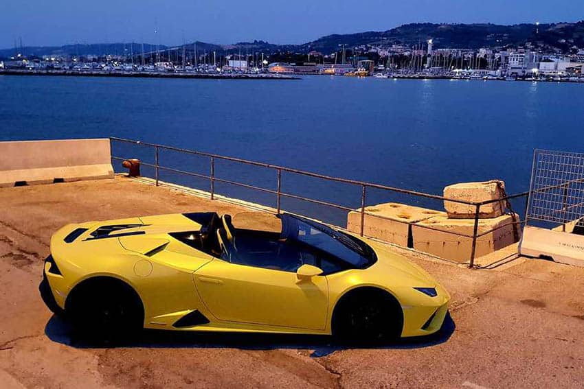 Supercar Drive: The Bad A$$ Raging Bull 5 San Benedetto del Tronto pier at dawn.