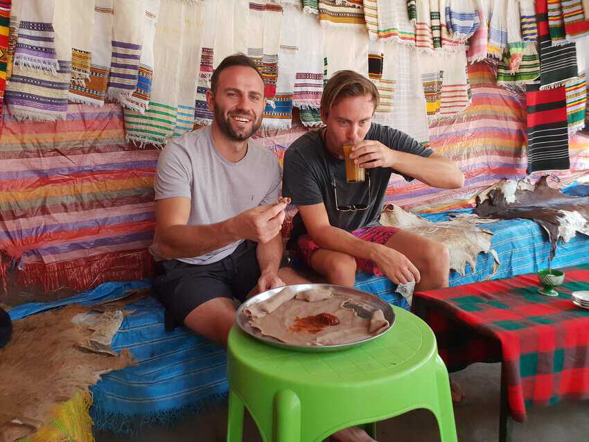 Coffee and Injera with The Traveling Ape 1 Mike Richards enjoys injera in Addis Ababa.