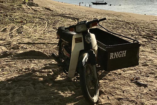 Sidecar scooters are the preferred vehicle by locals in Tioman