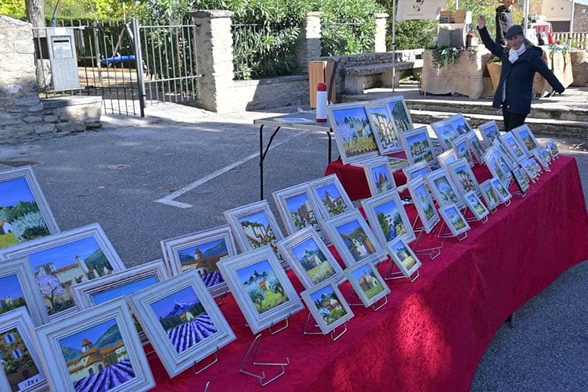 Provence: Roman Ruins, Van Gogh, and Wine 12 Artist selling her artwork on Market Day in Gordes