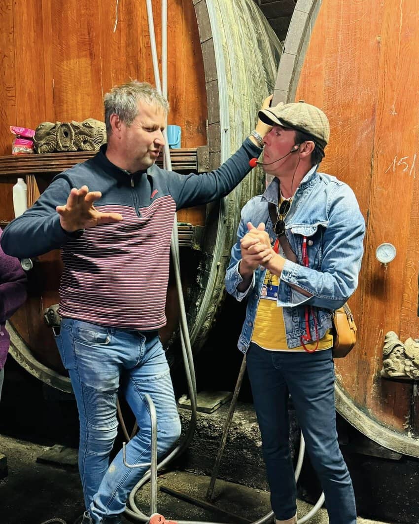 Alsatian winemakers explaining the local winemaking process. Photo by Noreen Kompanik.