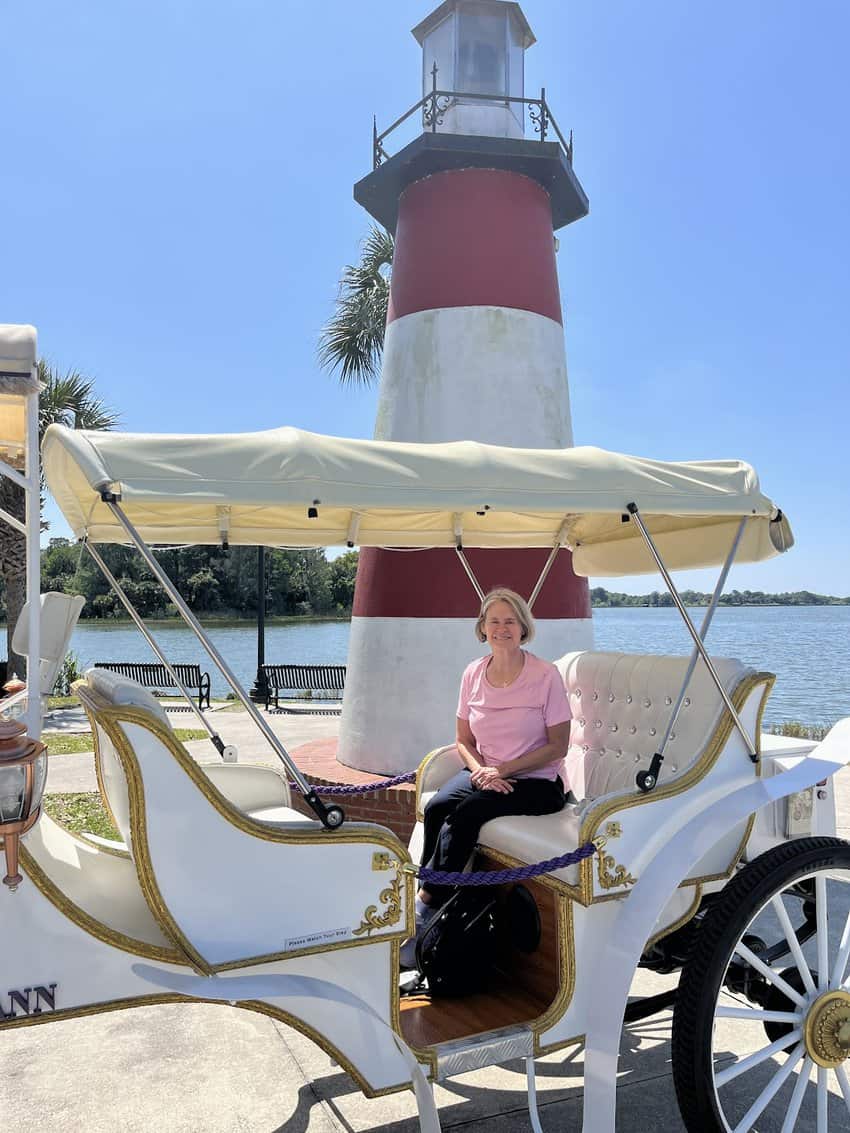 Innovative Transportation All Around Florida 4 Author riding the horseless carriage by Mount Dora Lighthouse. Kirsten Harrington photo