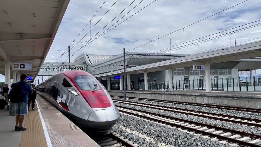 High speed electric locomotive pulls into the station in Jakarta, Indonesia. 