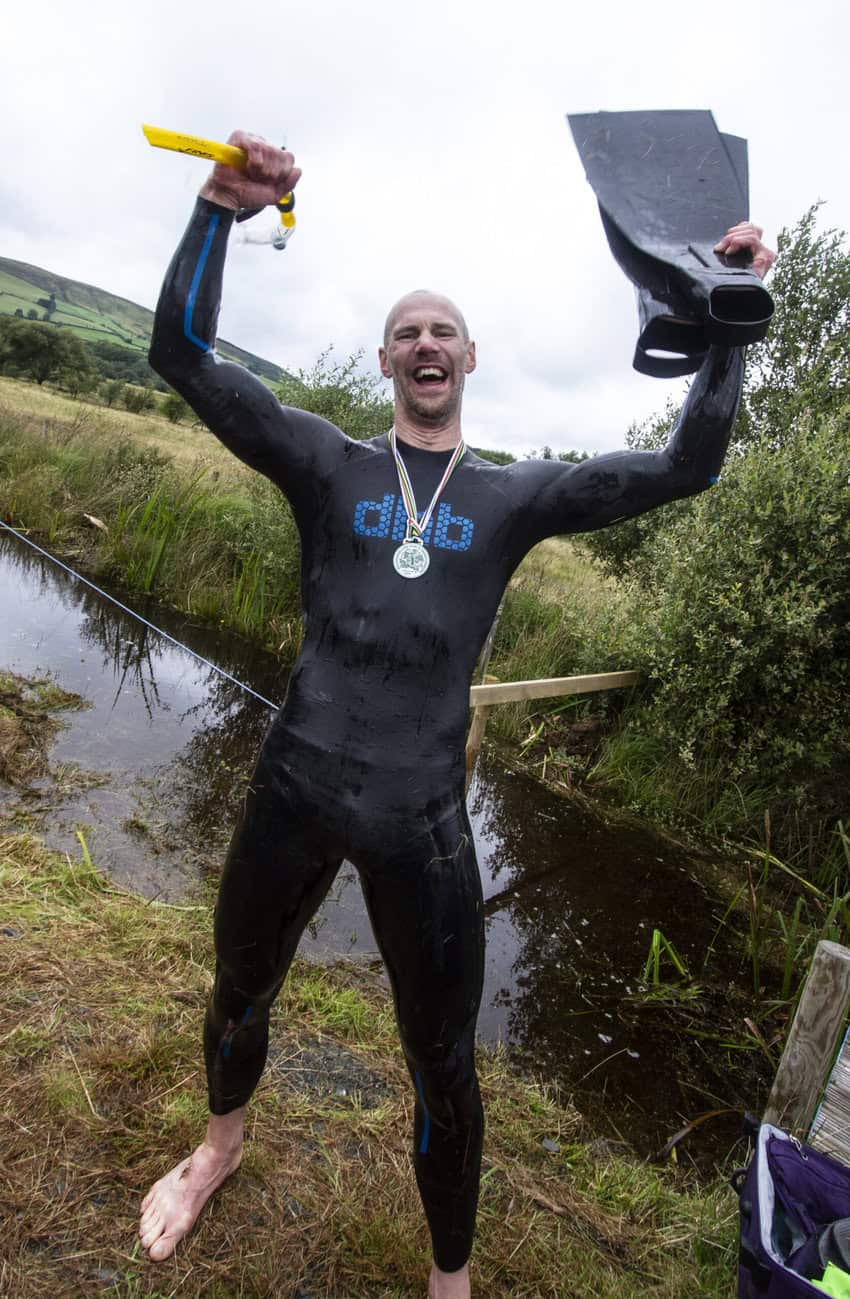 Neil Rutter consistently sets new records in bog snorkeling