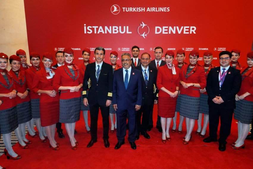 Turkish Airlines Launches Denver to Istanbul Service 4 Turkish Airlines first crew to land in Denver posing with it Chairman Ahmet Bolant