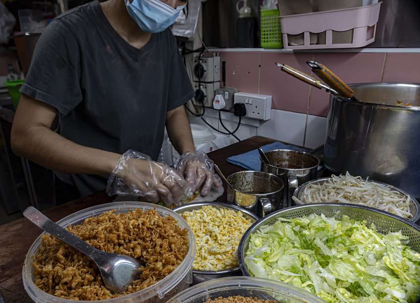 The Chinatown hawker center features food prepared in sanitary conditions that are regulated by the Singapore government. Photo by Donnie Sexton