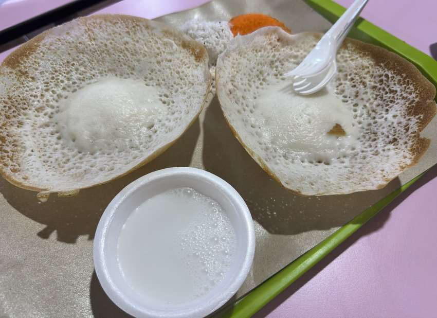 Appam is a thin crepe-like pancake made of fermented rice batter and coconut milk. Photo by Donnie Sexton