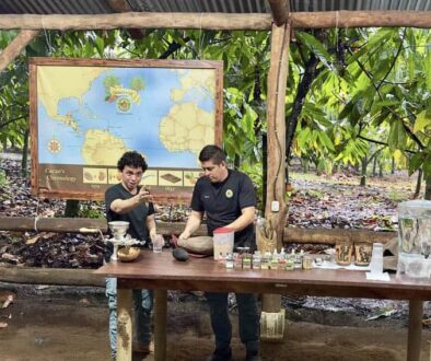 Our guides at the Rainforest Chocolate Tour preparing our chocolate samples. Photo by Judy Karnia