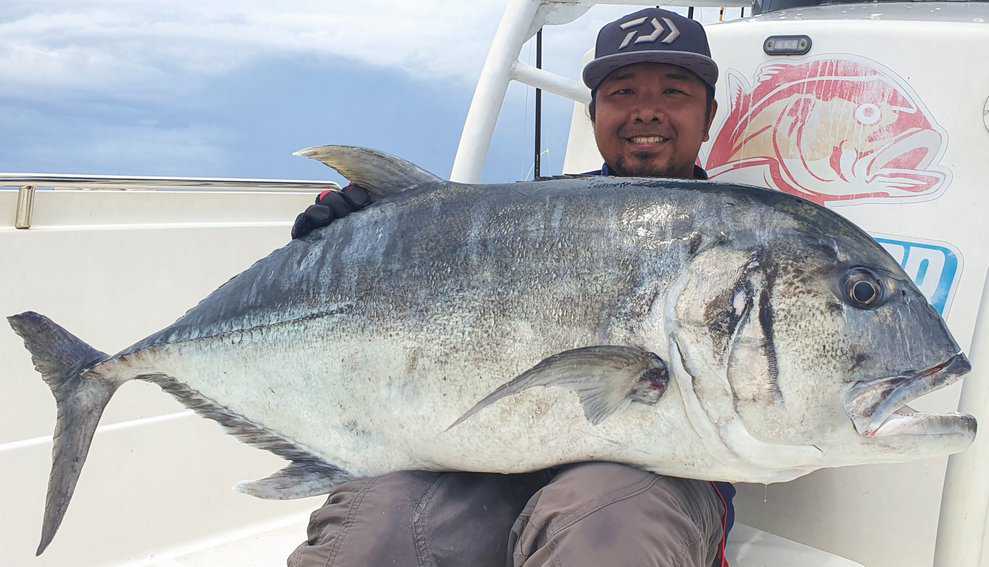 Chasing Giants: Sport Fishing in Papua New Guinea 2 Hecsterson and his trophy catch, Giant Trevally