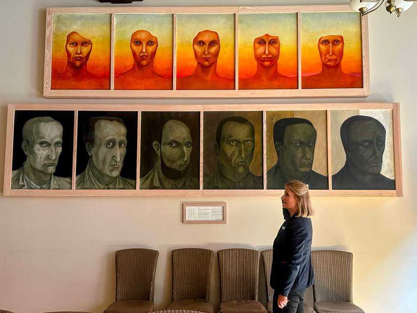Wroclaw Poland: A City Full of Dwarfs 9 Art Hotel Manager Anna Walesa discusses local art on display in the hotel.