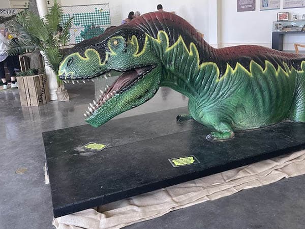 Grapevine, Texas: Historic, Charming and Accessible 16 Dinosaurs at Visitors Building. Photo by Jack Dunphy