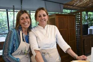 Sisters Pia (left) and Francesca help to run the family's enterprises, including the nursery, greenhouse, cooking classes, and the Fattoria Terranova farm.