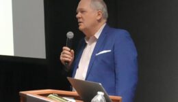 Max Hartshorne, editor of GoNOMAD, speaking at the Travel and Adventure Show in NYC in 2022.