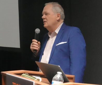 Max Hartshorne, editor of GoNOMAD, speaking at the Travel and Adventure Show in NYC in 2022.