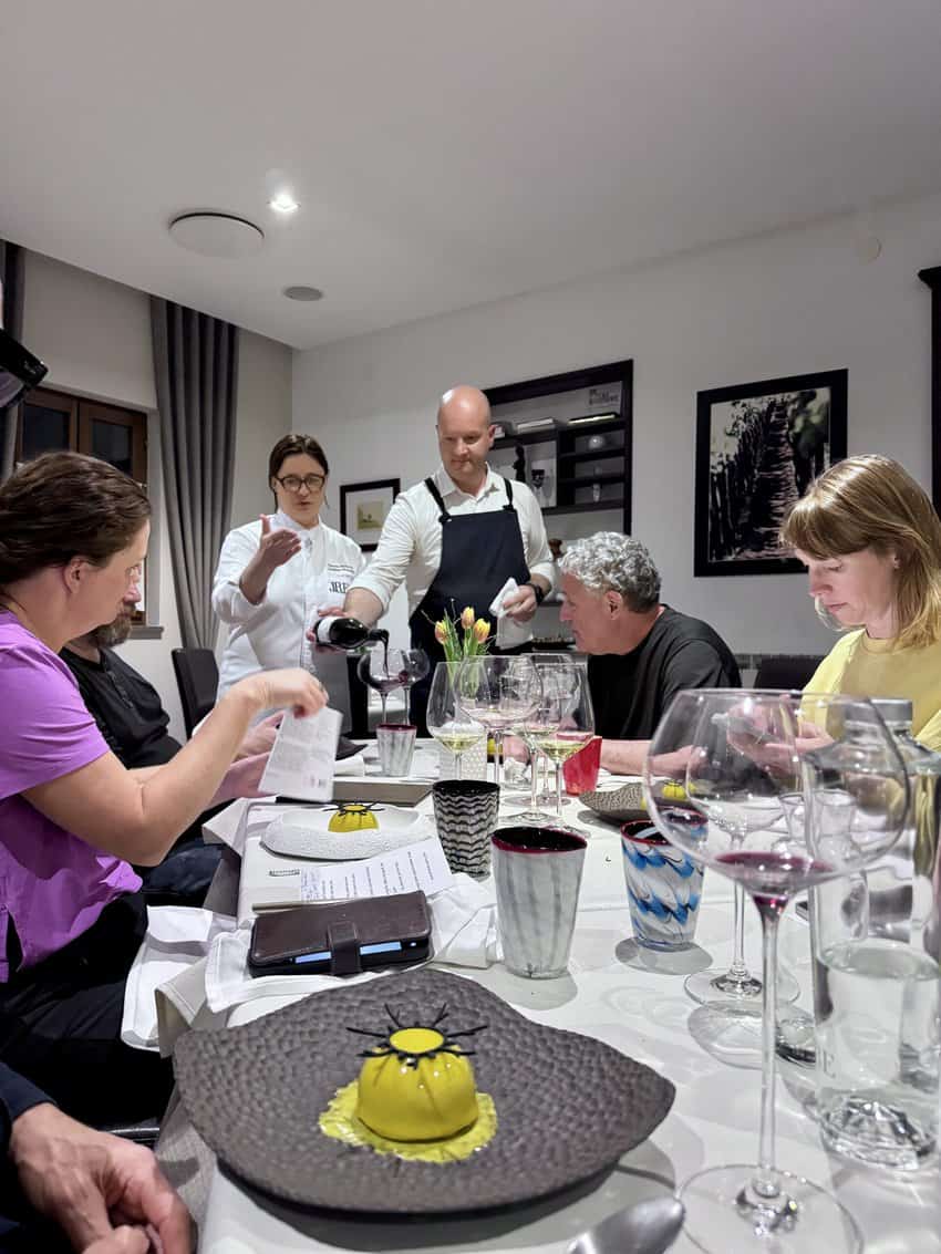 Ksenija and Martin at the table in their restaurant Gostilna Mahorčič.