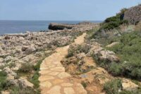 Walking path along the sea in Antibes, France.